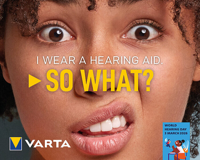 Close-up of woman's face with text I wear a hearing aid. So what?, VARTA logo, World Hearing Day 3 March 2026