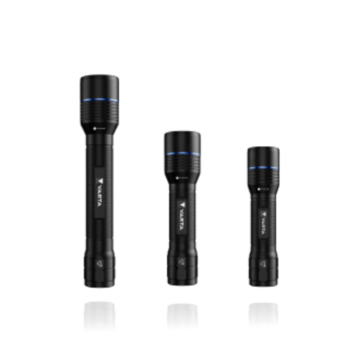 Three black Varta flashlights of decreasing size arranged side by side, each with a blue accent ring near the head