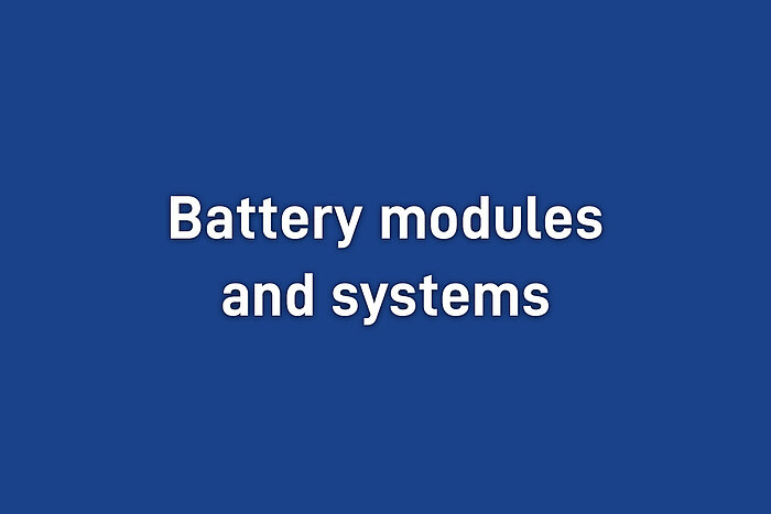 Text graphic on blue background reading Battery modules and systems in bold white lettering