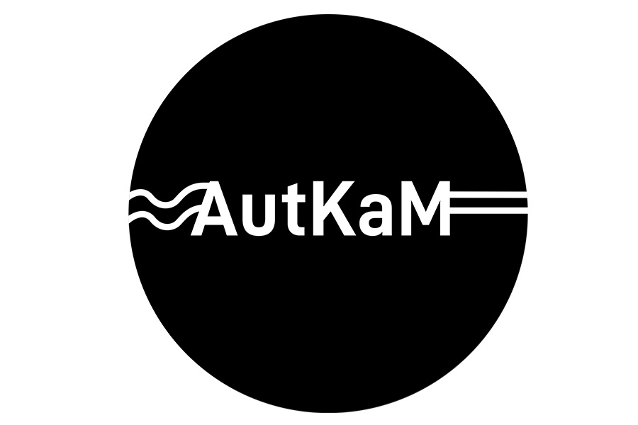 Black circular logo with white text AutKaM, flanked by wavy lines on the left and parallel horizontal lines on the right